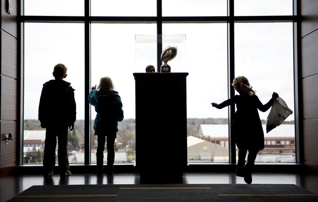 Youngsters look out a window on the club level during the Be a Hero at the Big House blood drive on Sunday. Daniel Brenner I AnnArbor.com